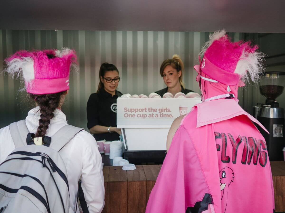 Baristas serving attendees at Mothers Day Classic