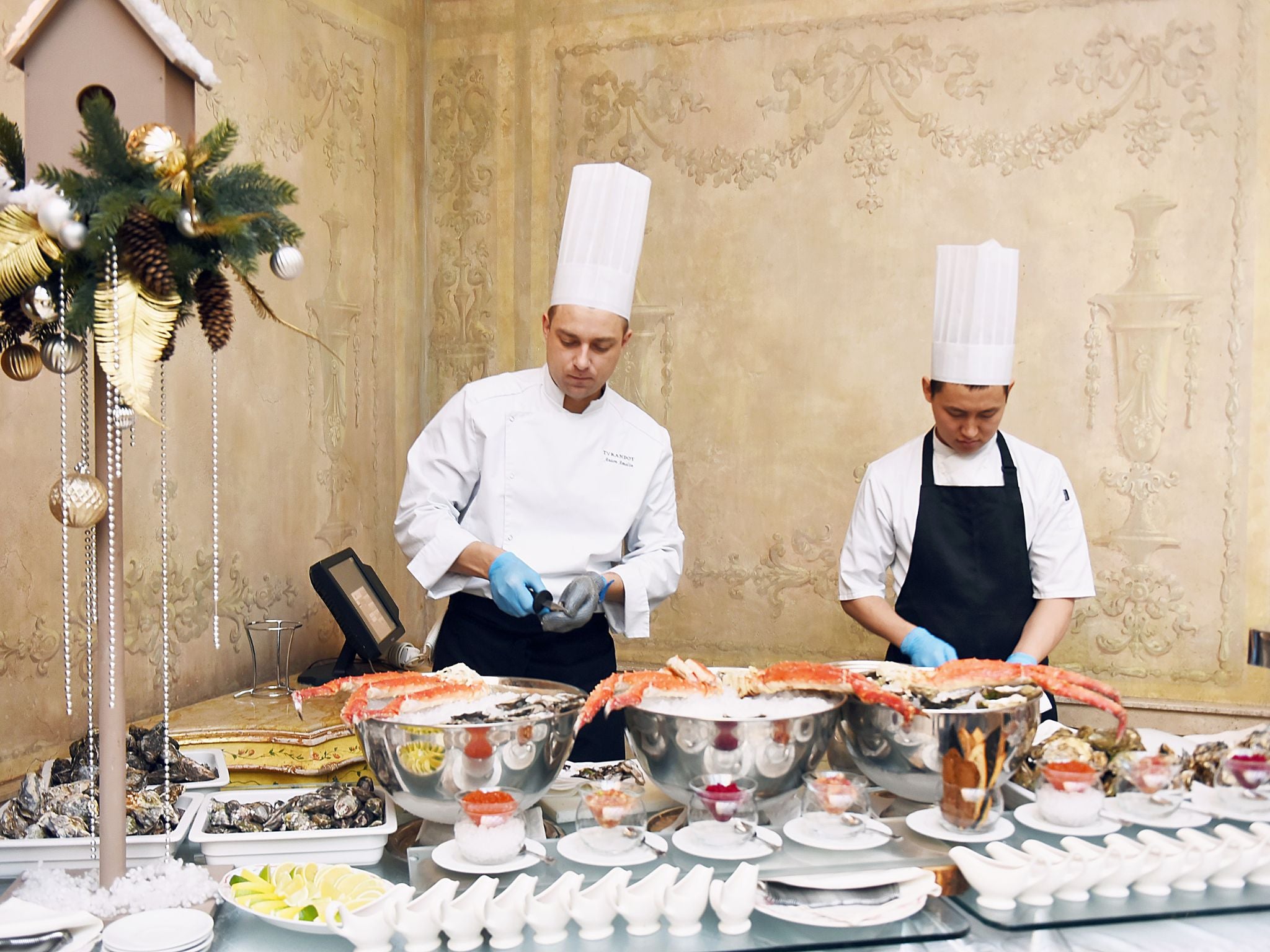 Chefs at catering table at event