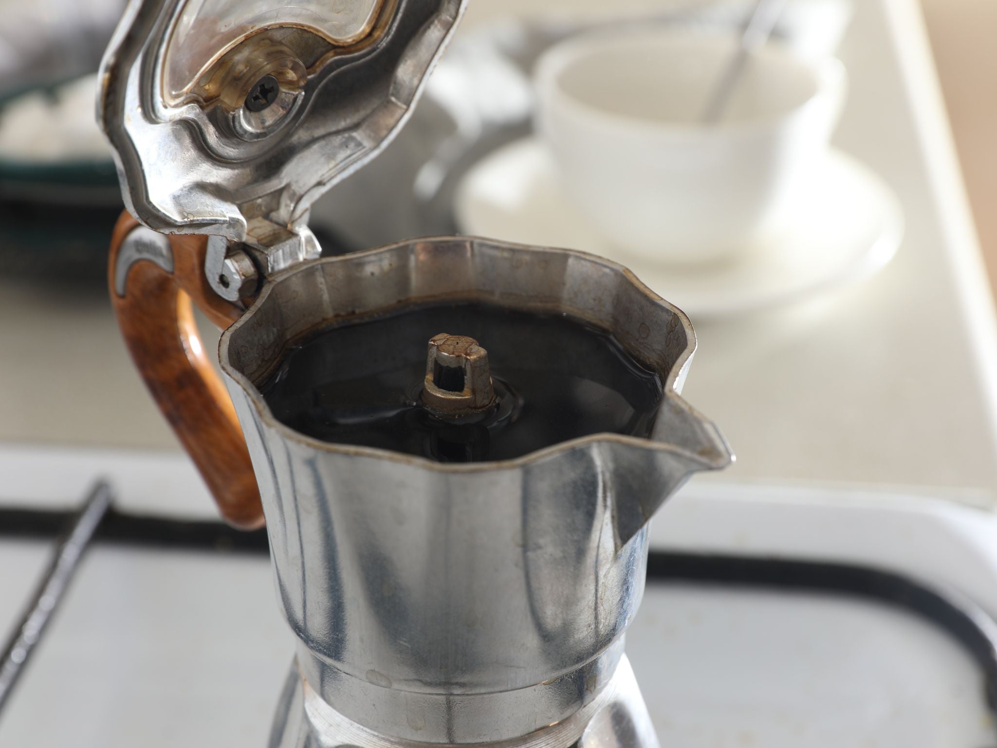 Coffee brewed inside of moka pot brewer