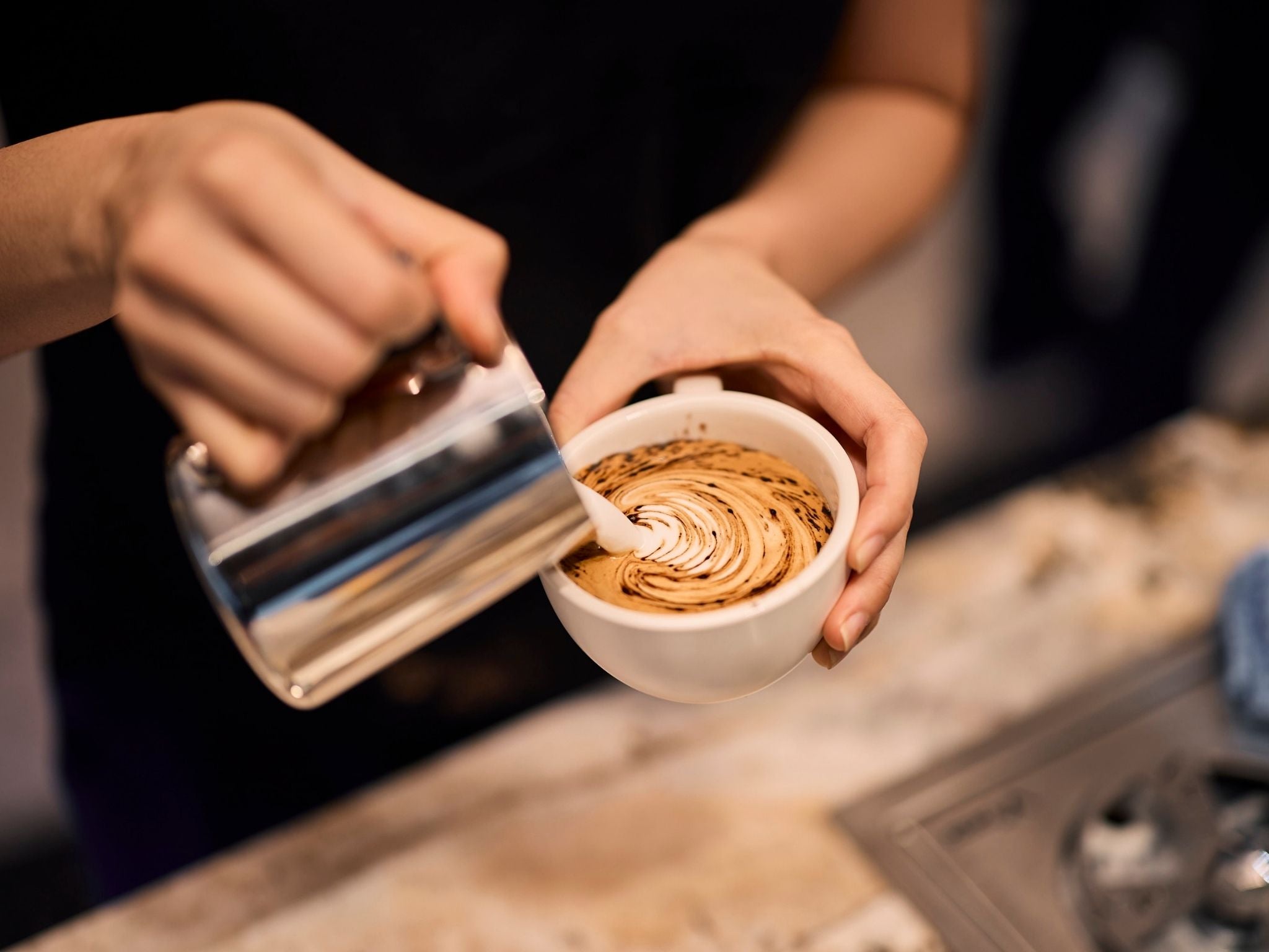 Coffee poured into ceramic cup