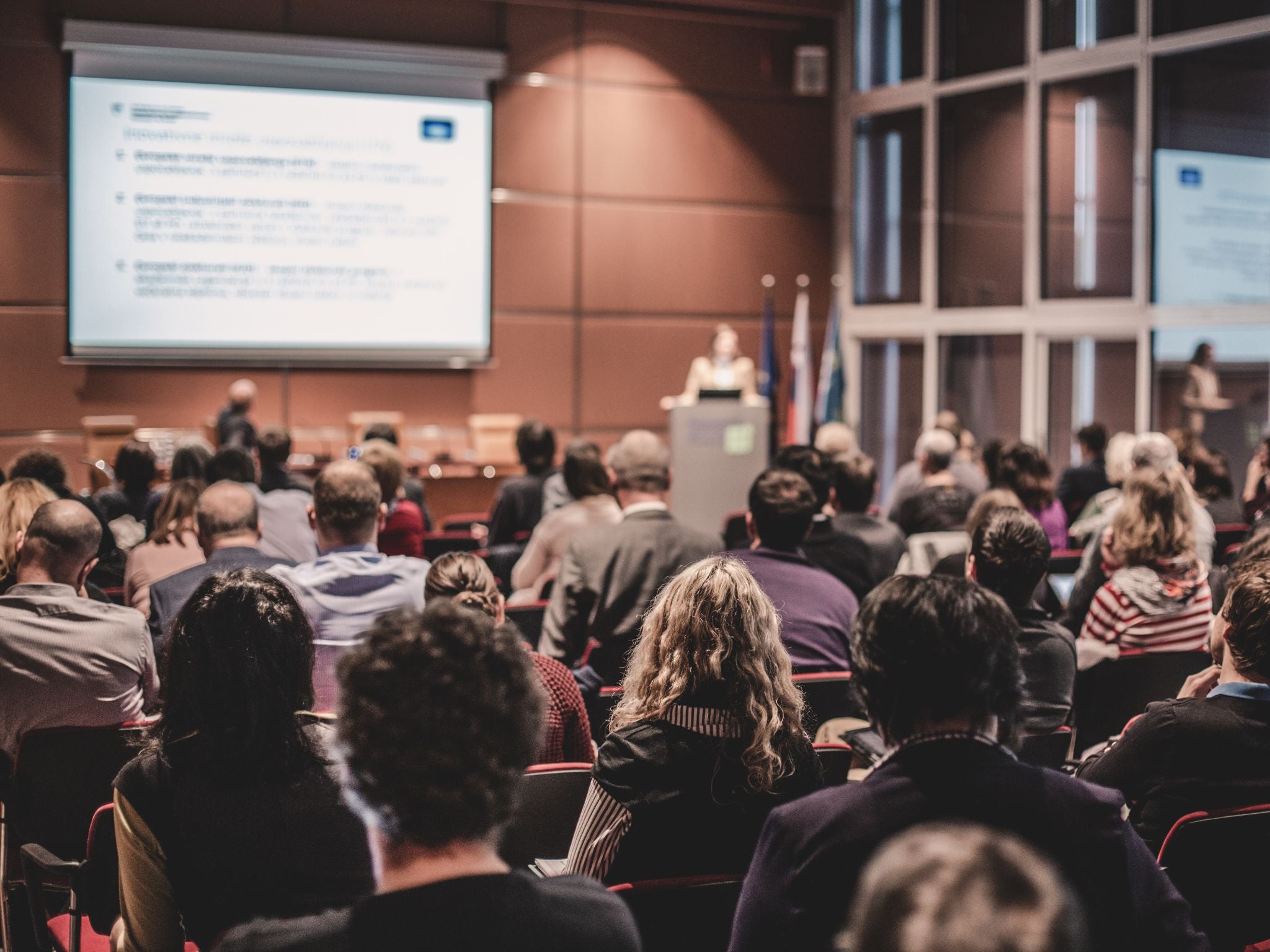 Event guests in session at conference