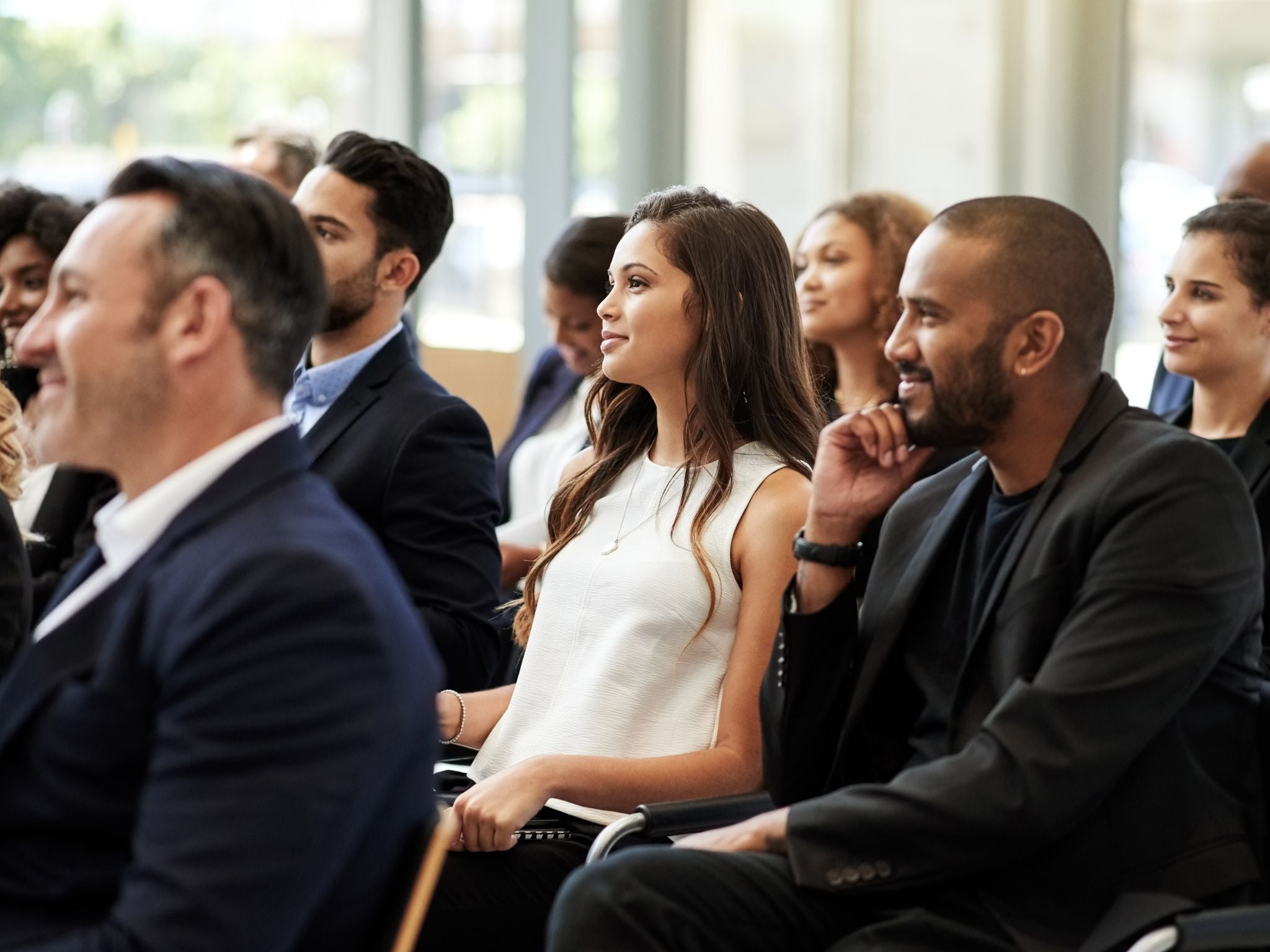 Guests engaged in event session