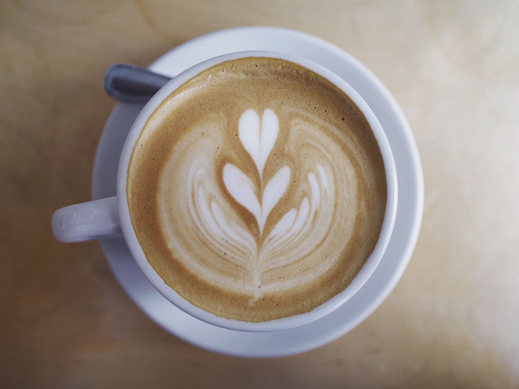 Latte art design in coffee mug