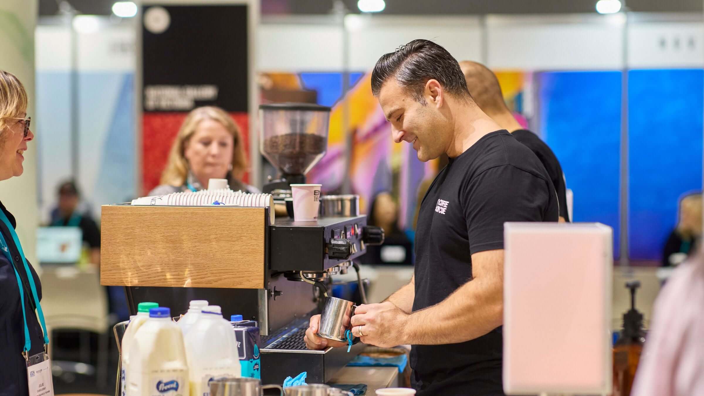 Coffee barista in service