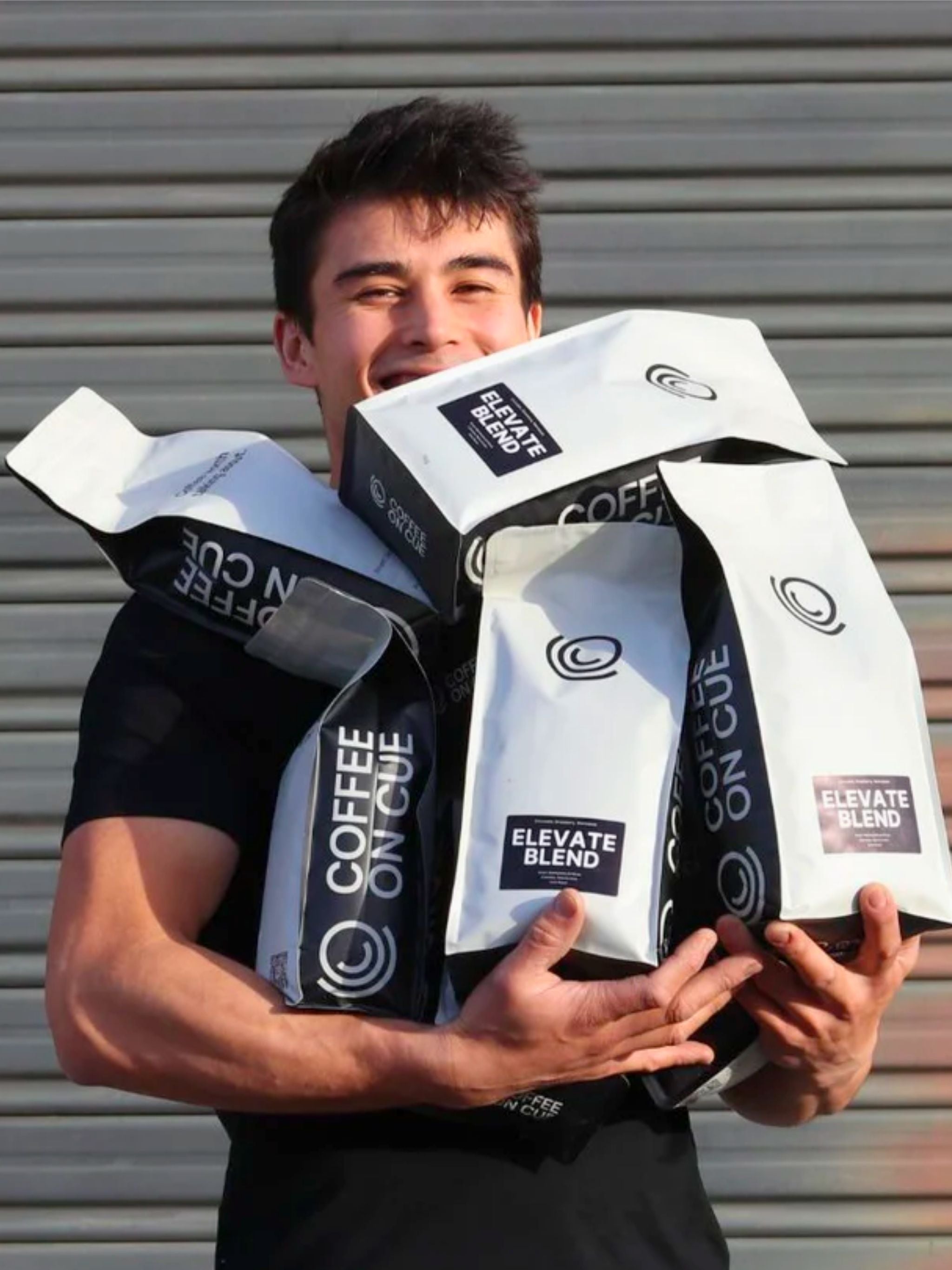 Barista holding coffee bags