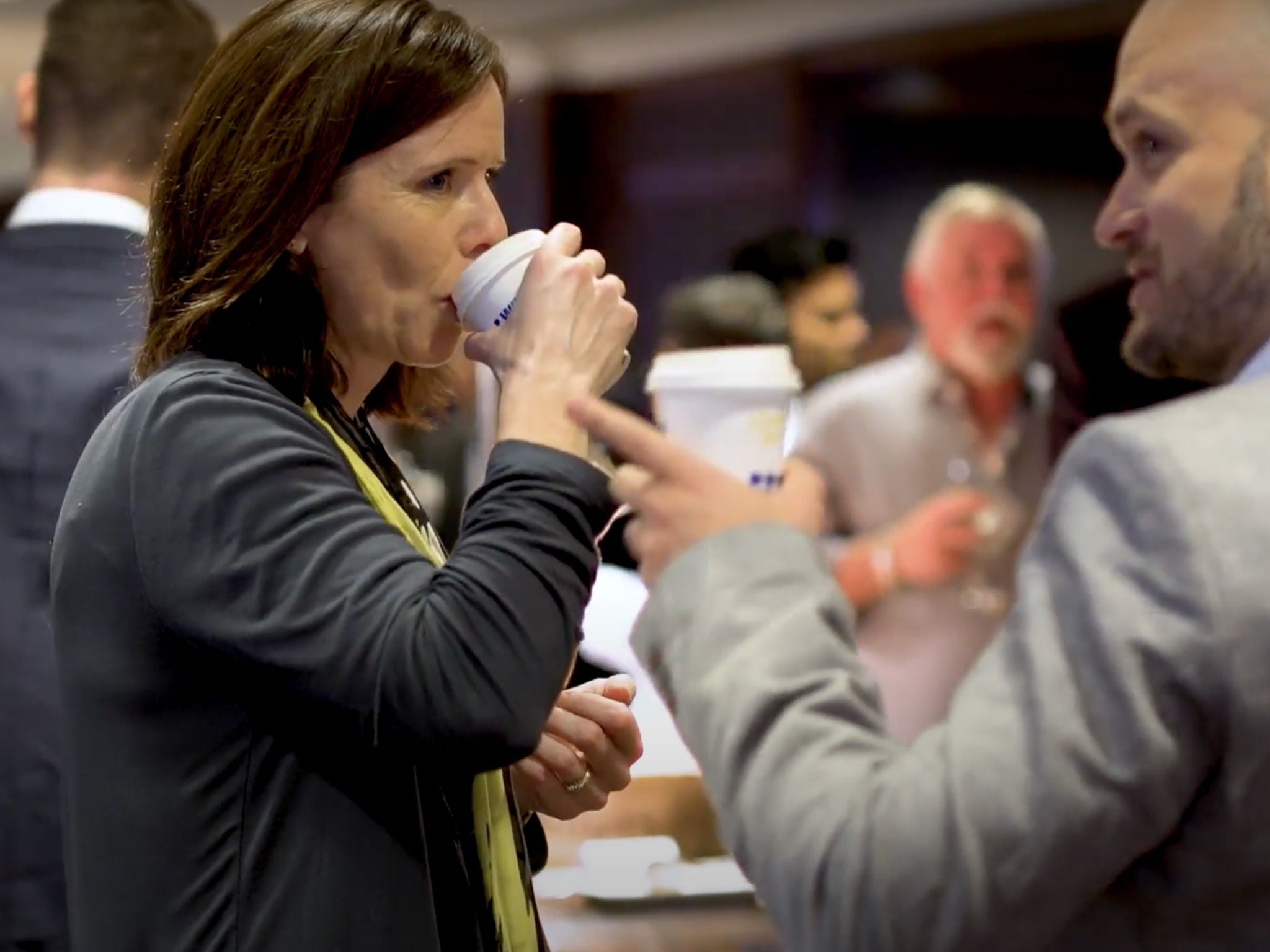 Conference guests drinking coffee