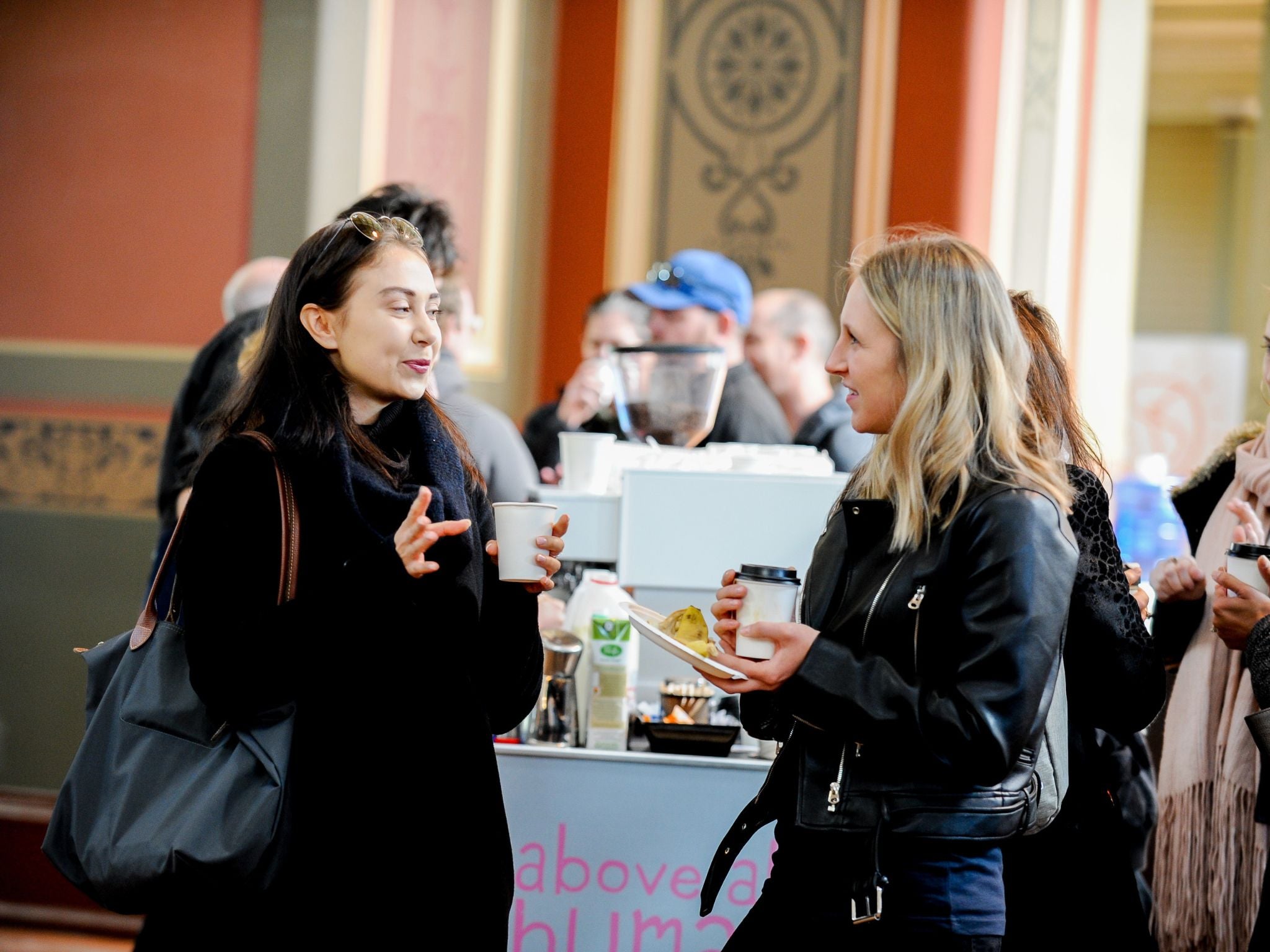 Conference guests drinking coffee