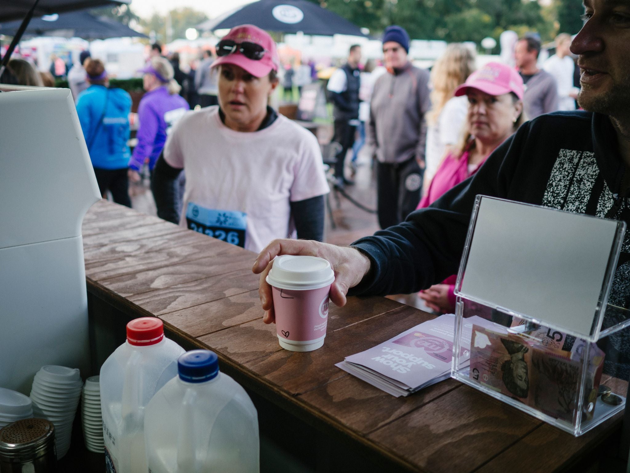 Event guest grabbing their coffee