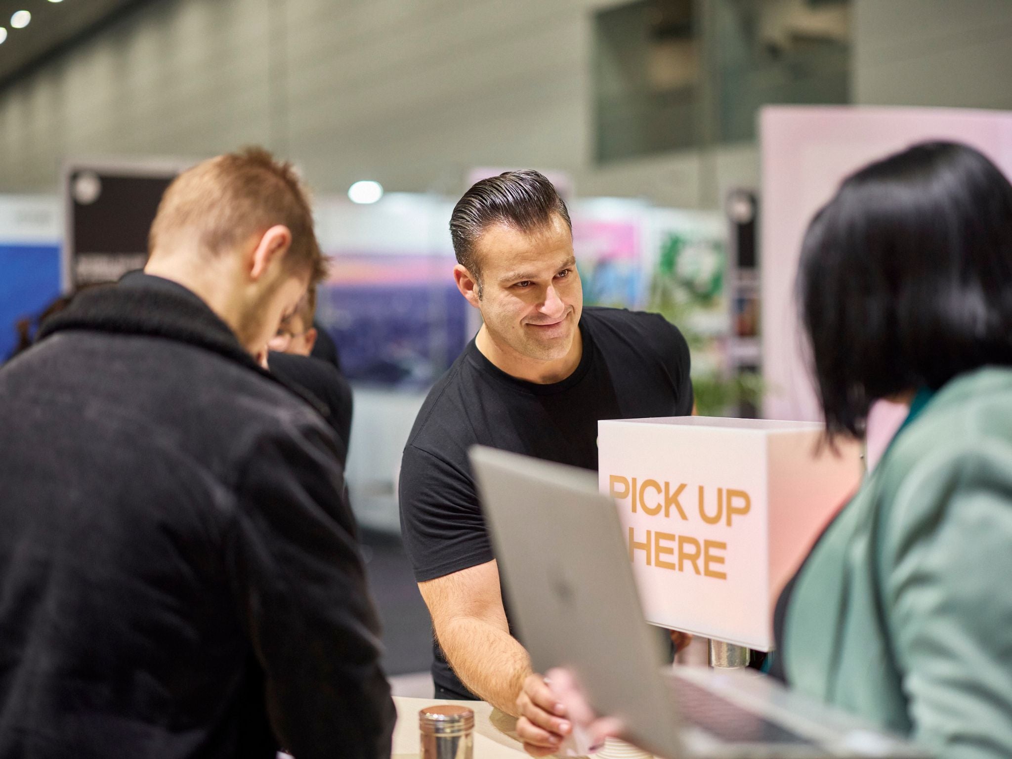 Trade show barista serving guests