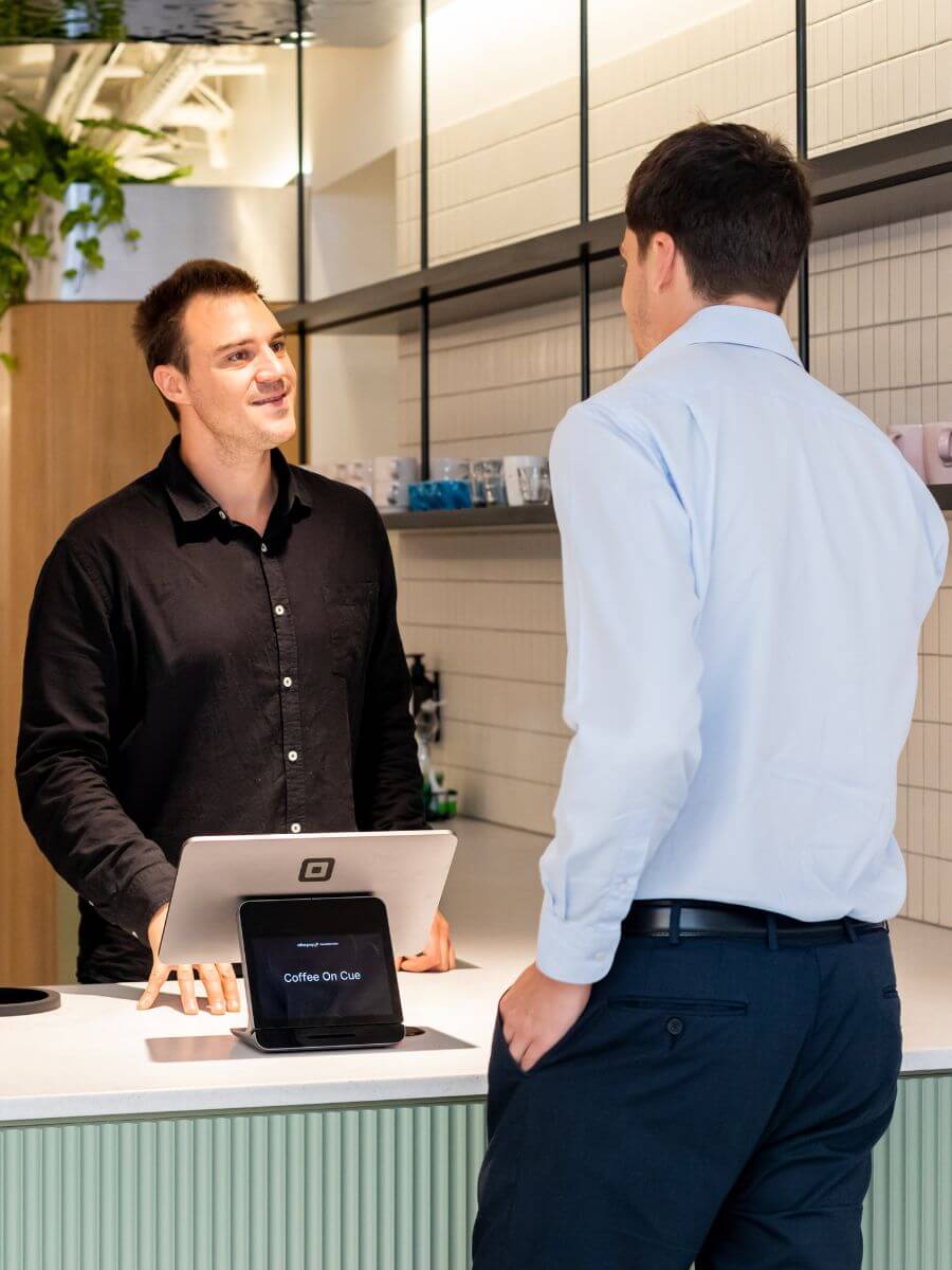 Toyota in-house barista taking coffee order