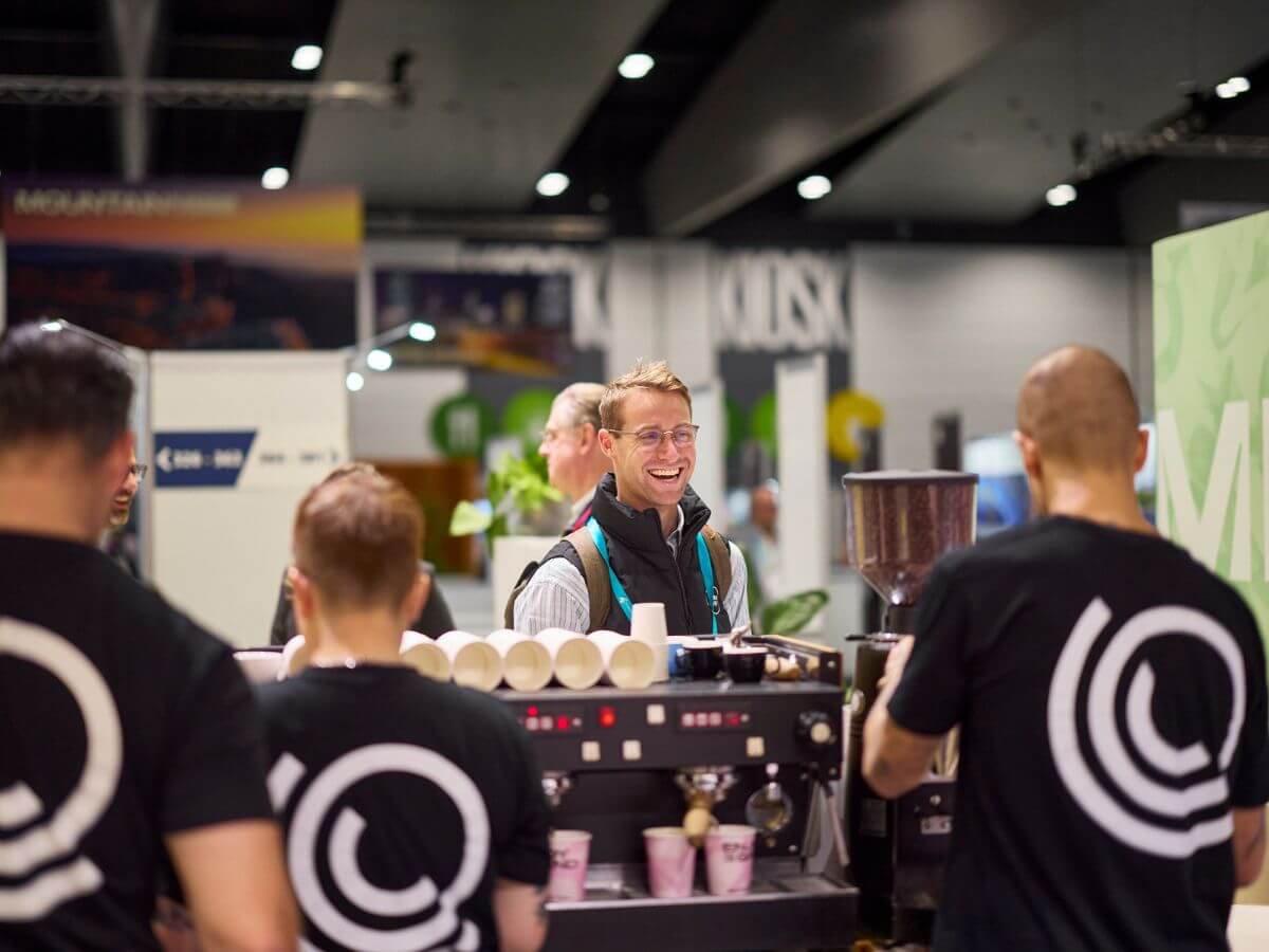 Tradeshow guest enjoying the coffee service