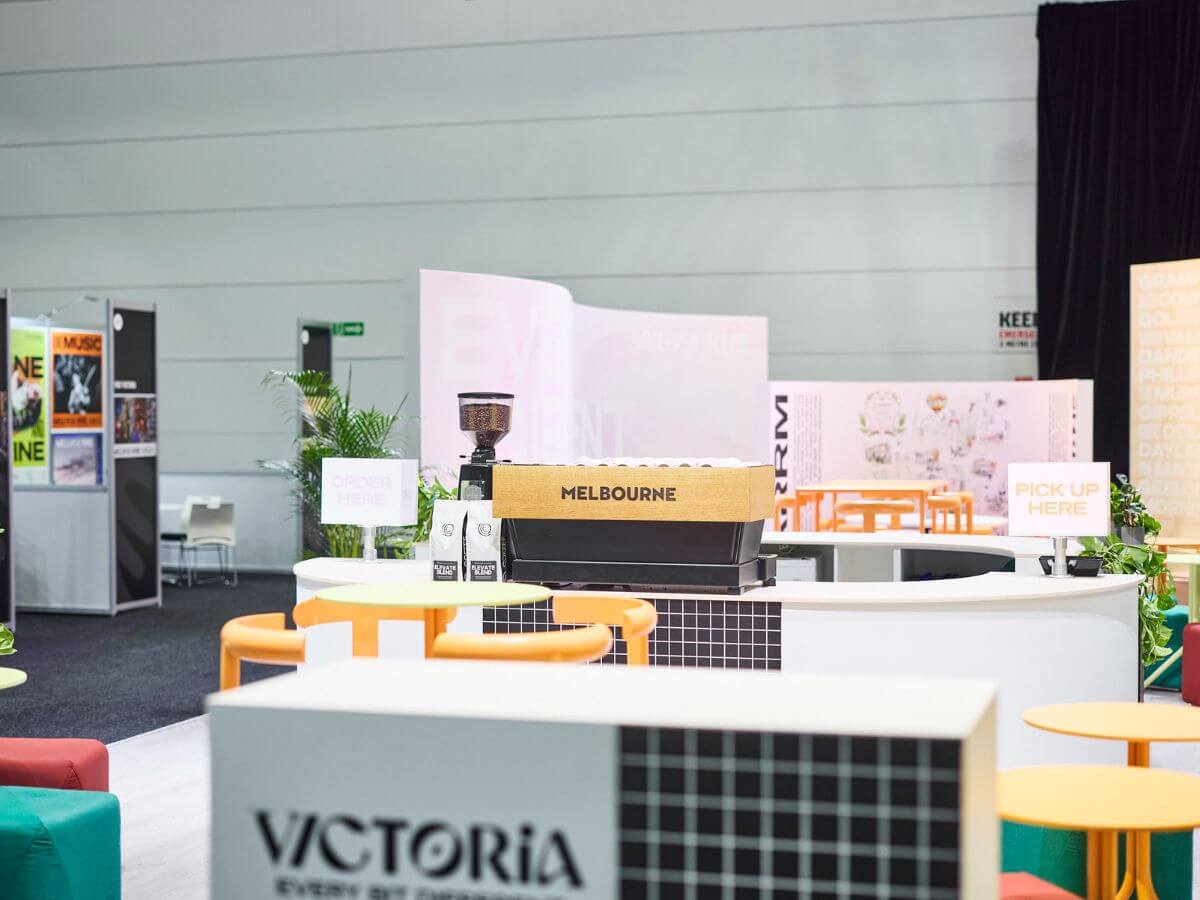 Visit Victoria tradeshow stand with coffee machine on bench