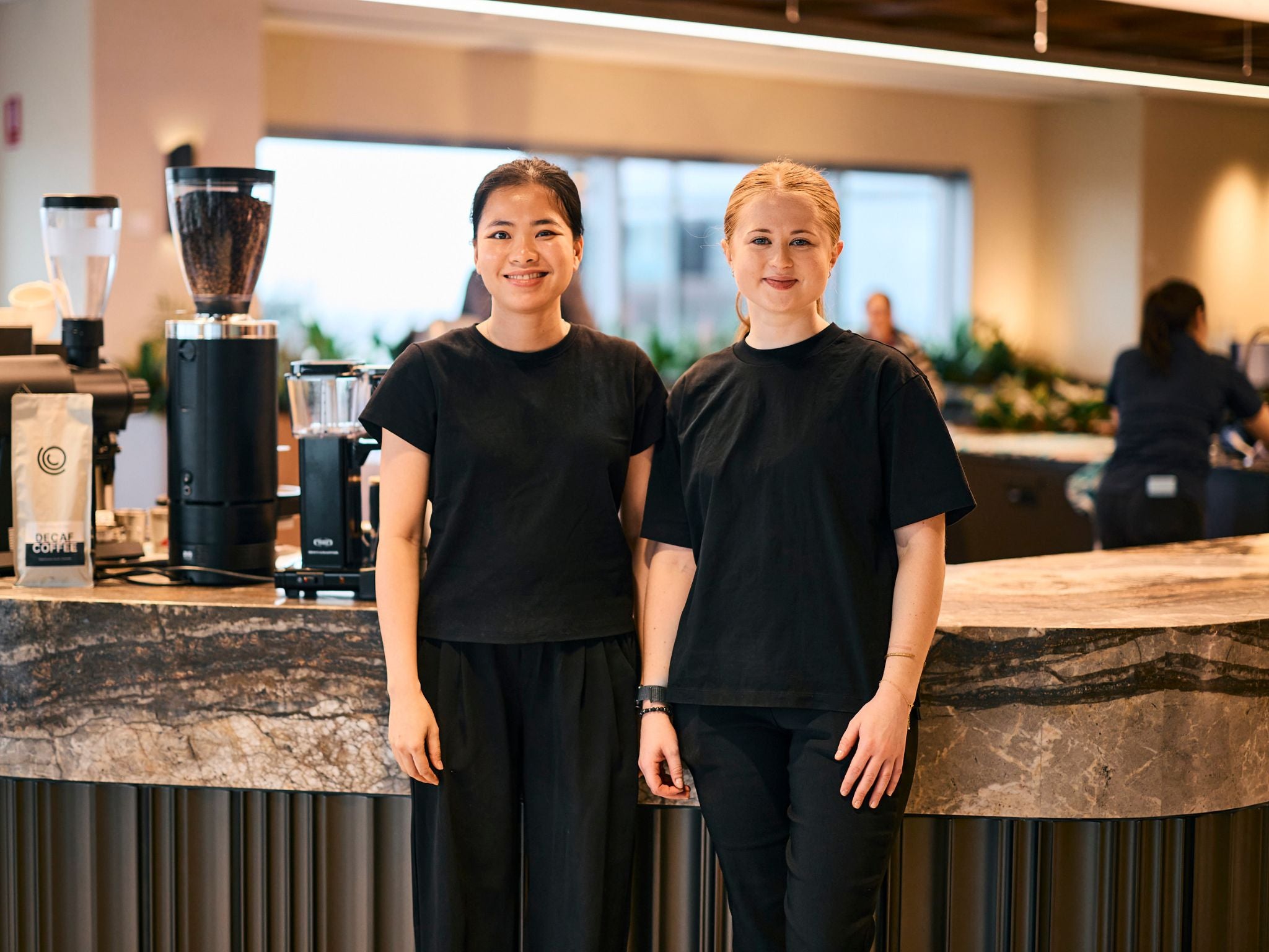 Workplace baristas at cafe